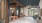 reception desk with large wood wall behind it