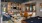 lounge with seating pool tables and kitchen with tv